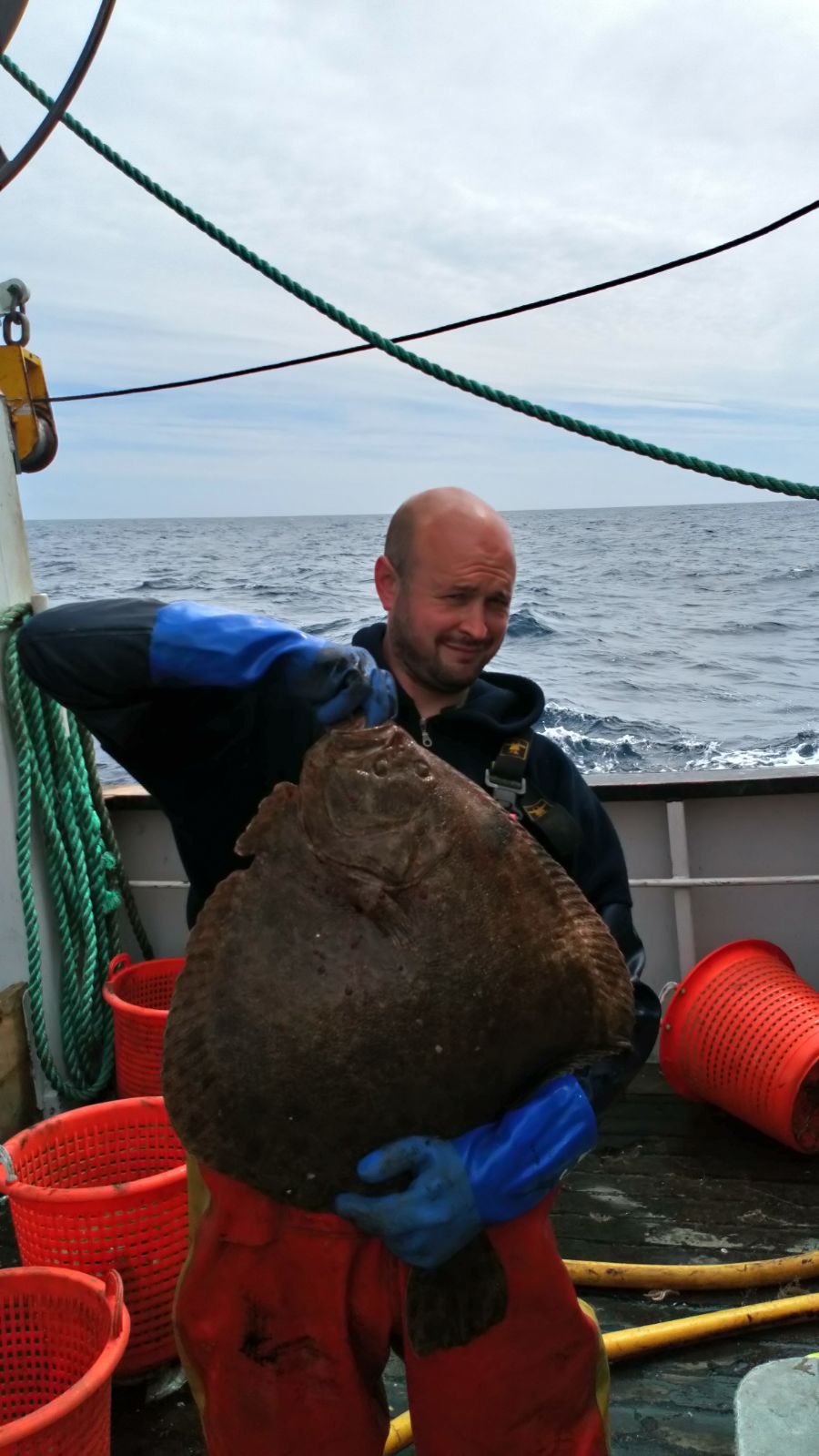 Crew holding a big turbot