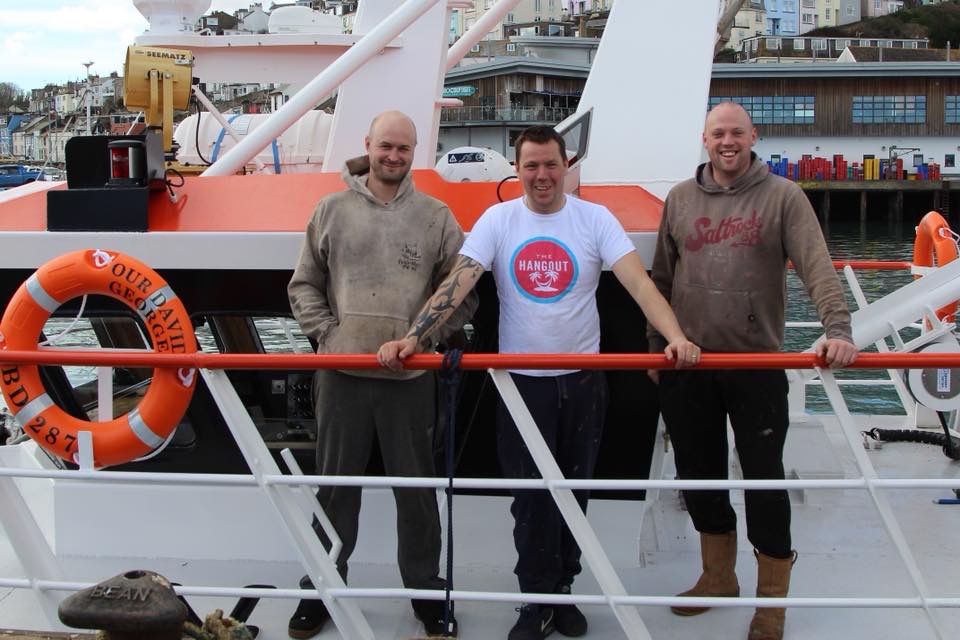 Three crew on the deck of BD287