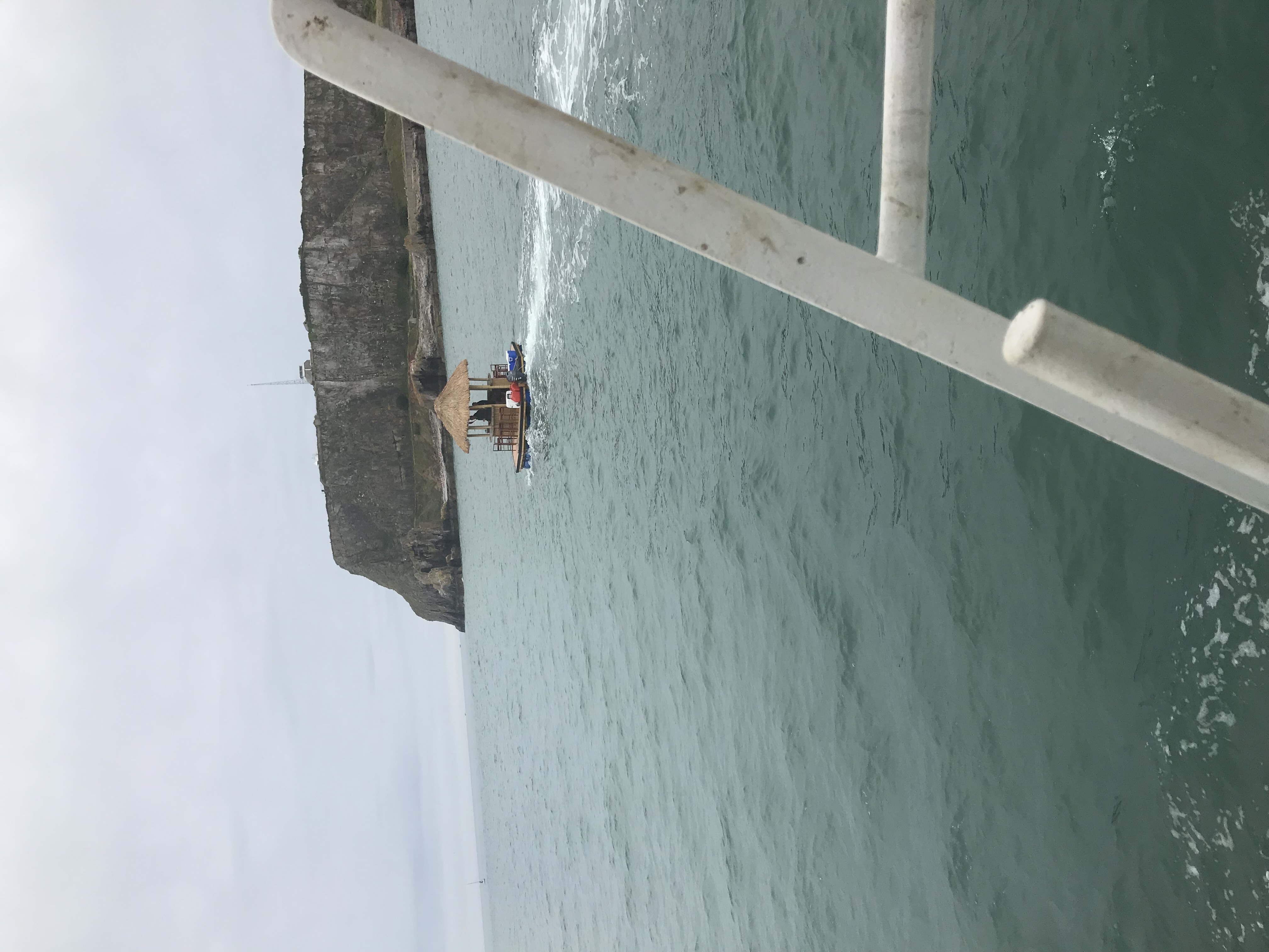 Tiki boat off Brixham headland