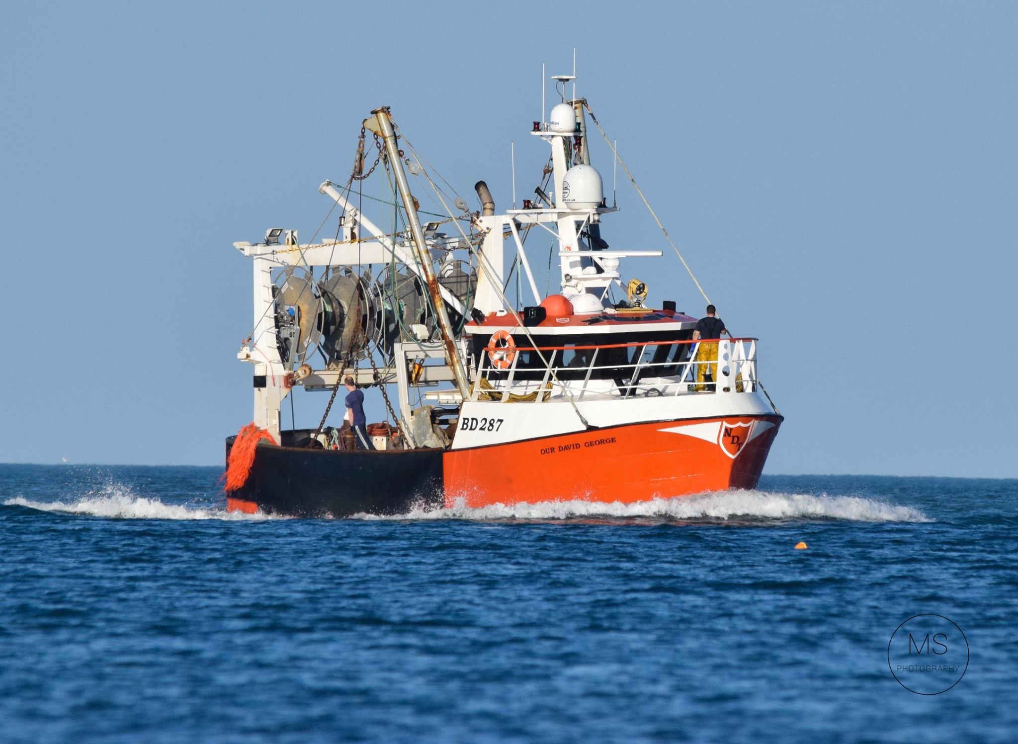 BD287 Our David George steaming — blue skies