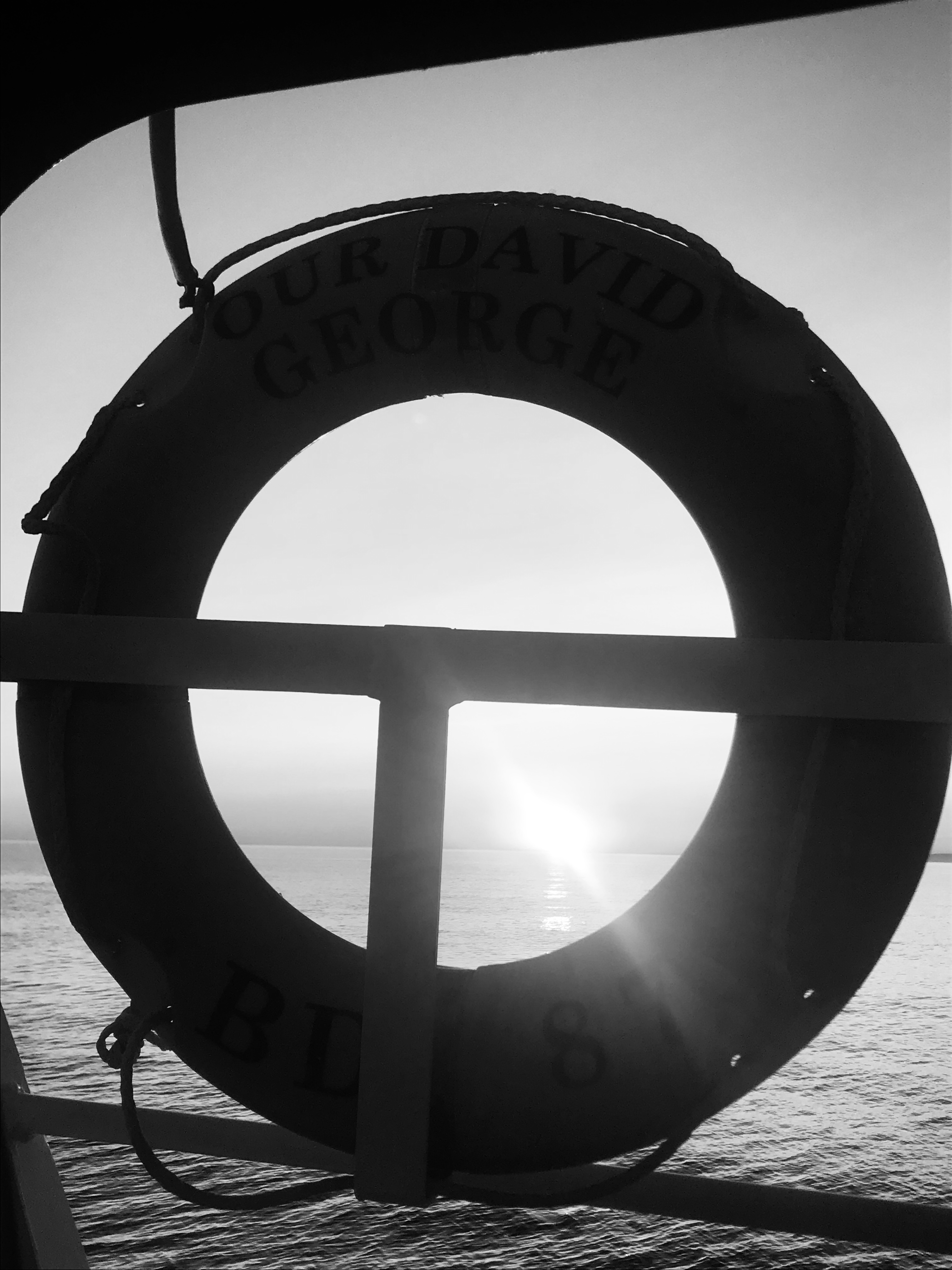 Life ring sunrise — black and white