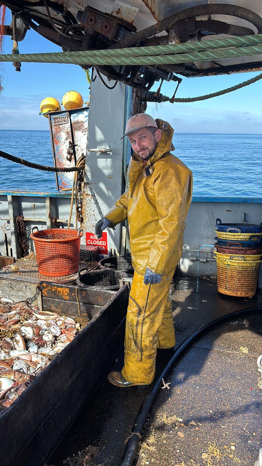 Crew member on deck with the catch